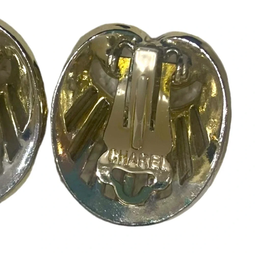Vintage Charel white gold-tone ribbed fan clip on earrings marked